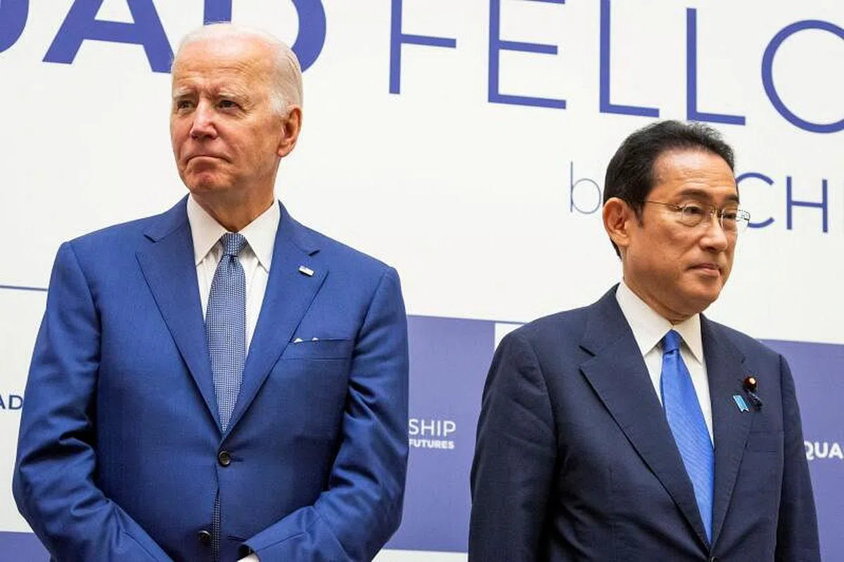 美国总统拜登（左）与日本首相岸田文雄在5月24日于东京出席“四方安全对话”（Quad）活动。（路透社） 