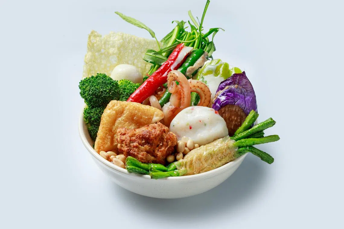 龙记酿豆腐的酿件选择多，有鱼肉馅和猪肉馅两种。（品牌提供）