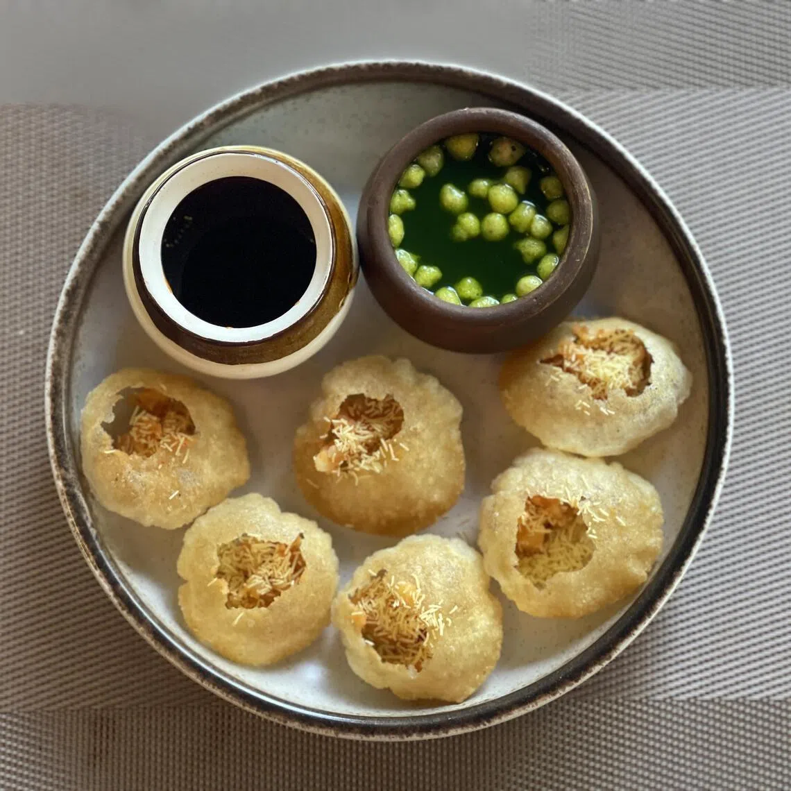 印度餐馆Bhoomi的街头食物Pani Puri，开胃可口。（黄靖晶摄）