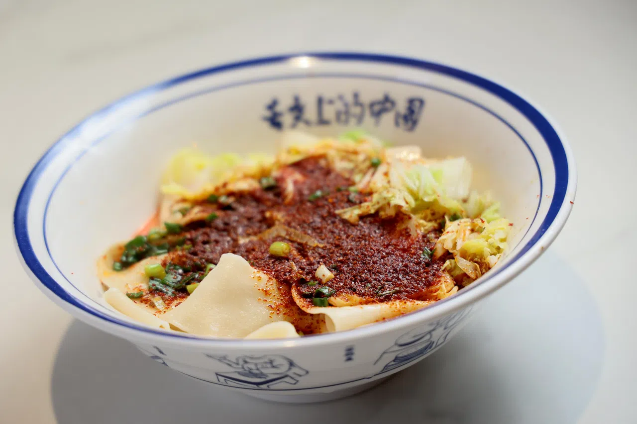 经典的油泼biáng biáng面。（龙国雄摄）