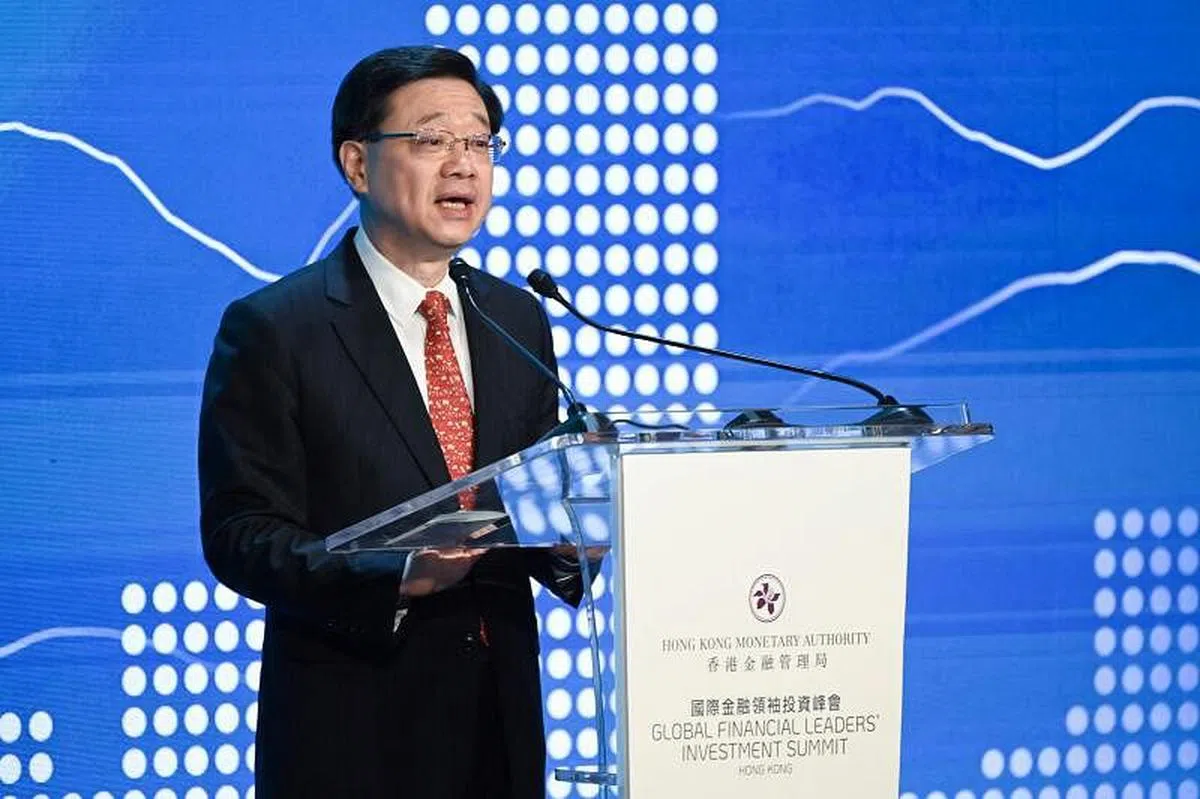 李家超星期三在峰会上信心喊话称，对香港而言，“最坏的情况已经过去”。（法新社） 