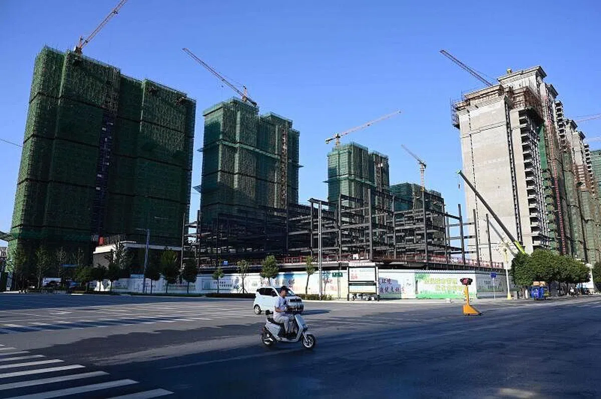 不少专家认为，一旦取消公摊，开发商或许将不再重视公摊部分的建设，进而影响房屋整体的建设质量。图为去年9月恒大集团在河南省驻马店市住宅项目的施工现场。（彭博社档案图）