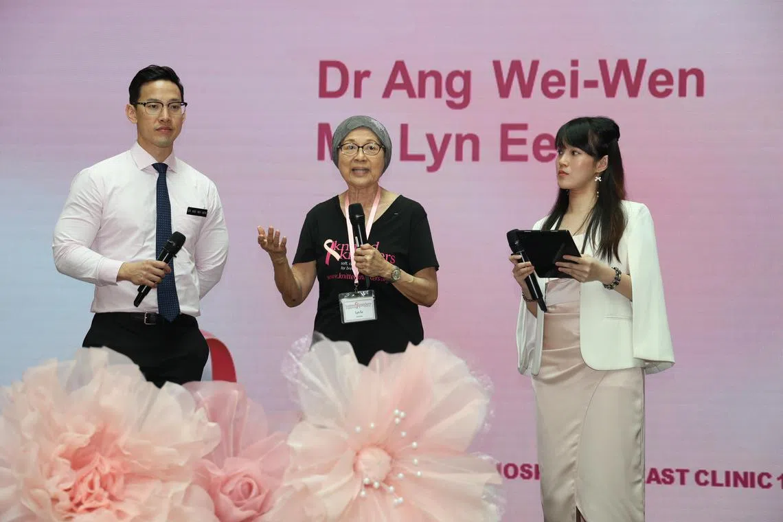 余春莲（中）和陈笃生医院乳腺专科诊所洪炜文顾问医生（左）一同上台讲解乳癌相关知识，以及乳房切除术后须知等。（郑一鸣摄）