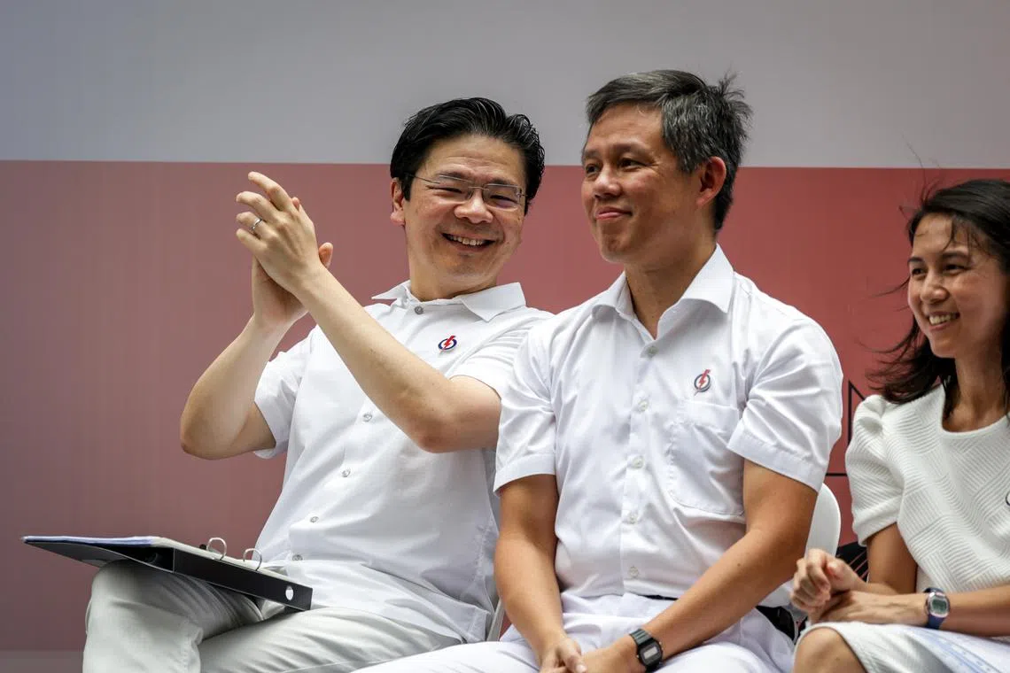 教育部长陈振声出现在浮尔顿午间群众大会，为其他候选人助阵。黄循财总理（左）上周点名四位部长是执政团队的关键成员，陈振声是其中一位。（叶振忠摄）