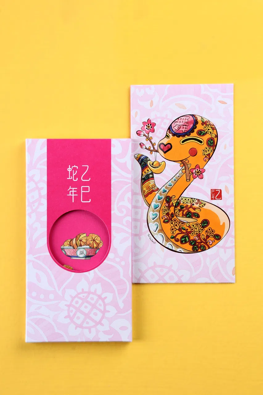 品印每年都跟插画家William Sim合作推出生肖红包封，灵蛇花枝招展。（龙国雄摄）
