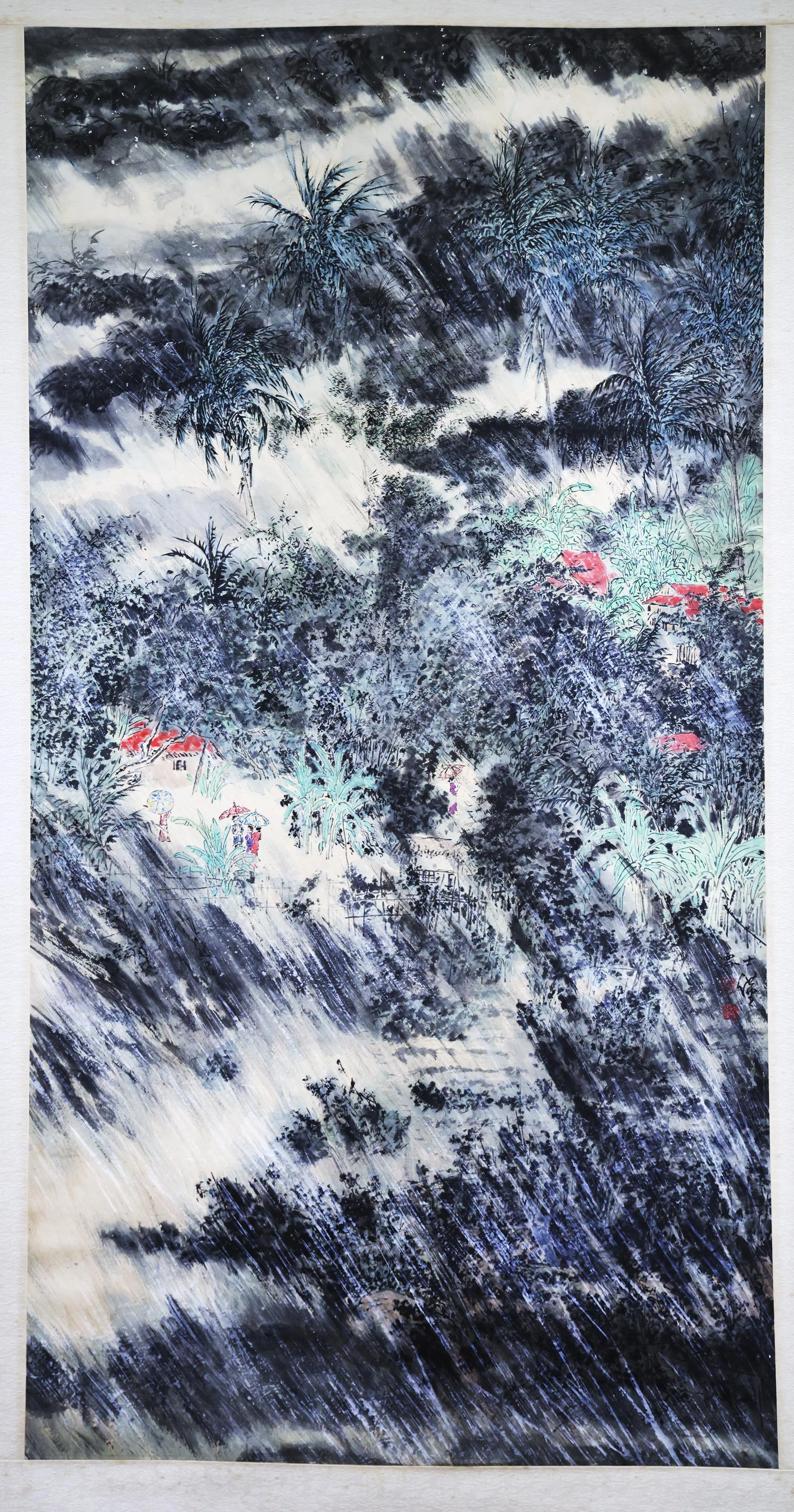 陈士仅水墨画写老挝甘榜的雨景。（陈渊庄摄）