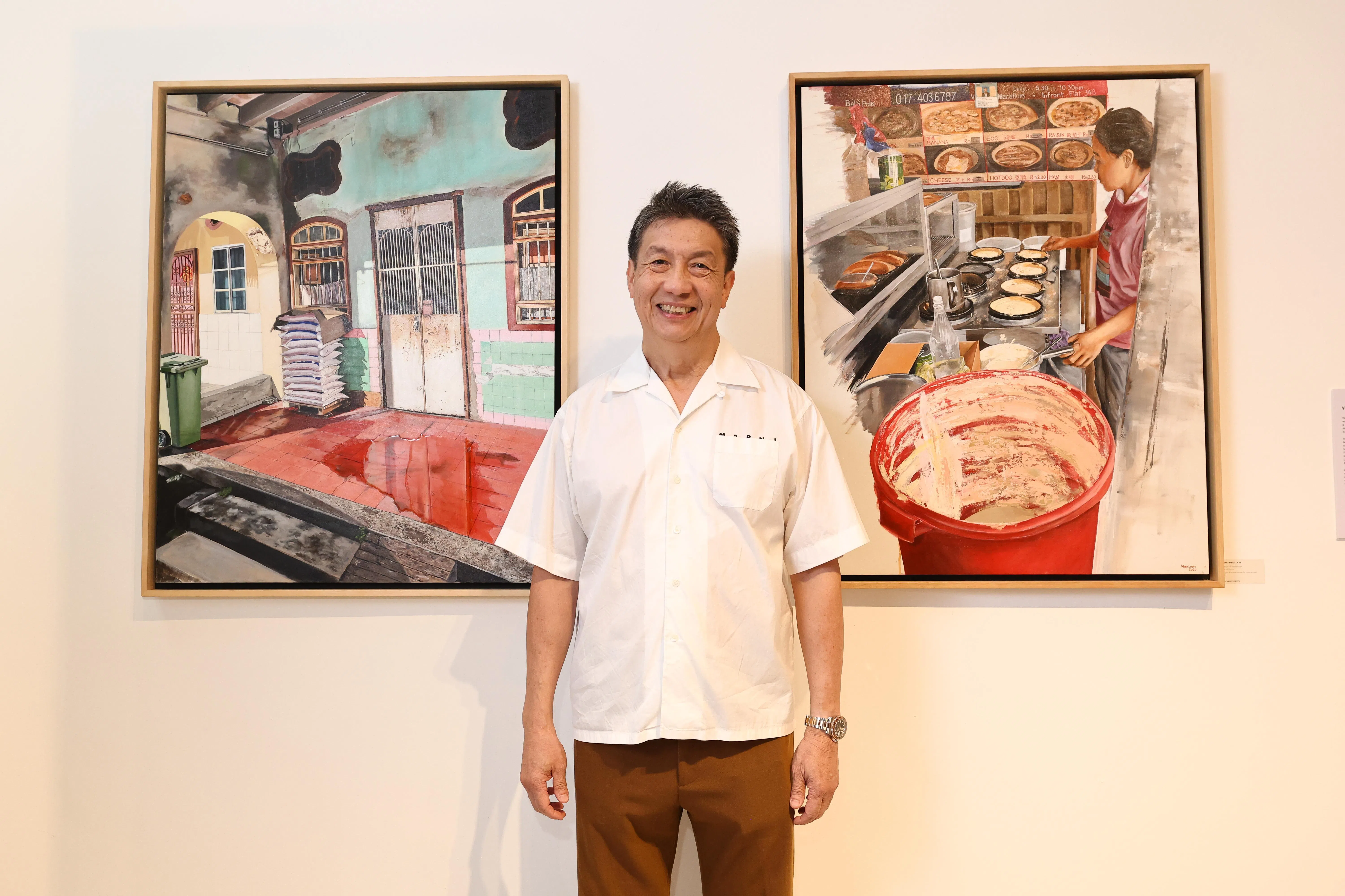 杨伟伦新作以槟城店屋与美食为题材。（大华银行提供）