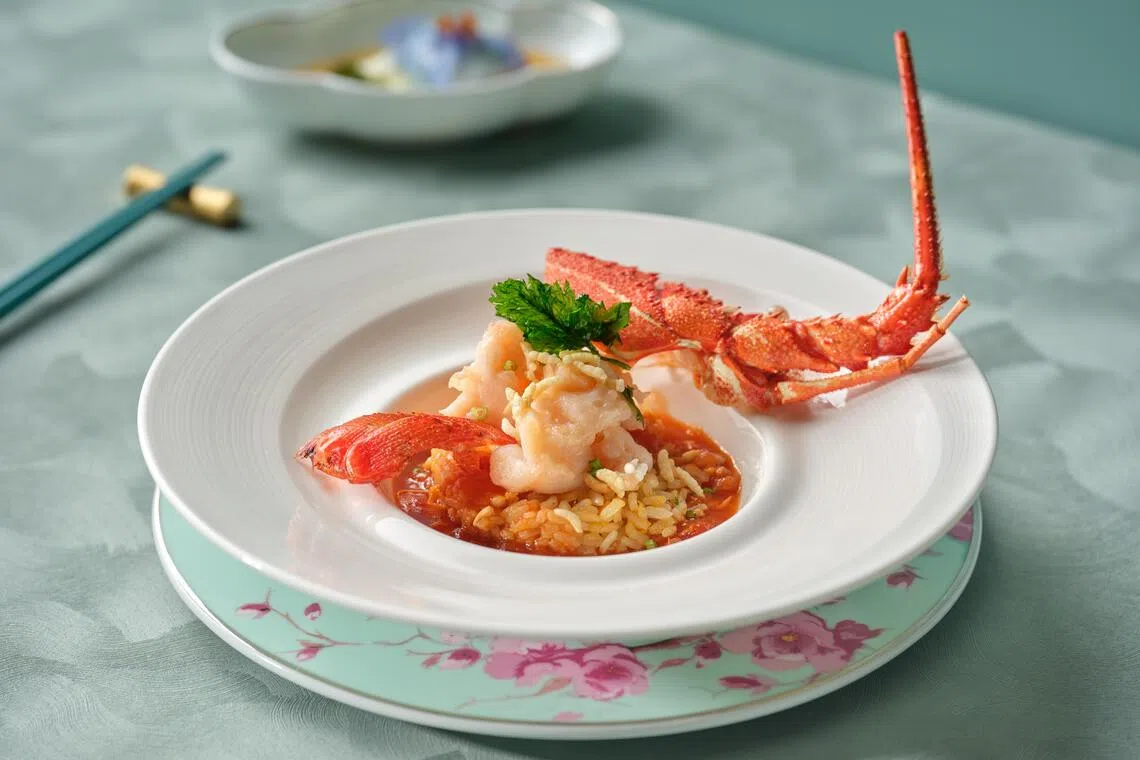 西红柿香泡龙虾球烩饭，展示澳大利亚龙虾的鲜甜。（餐馆提供）
