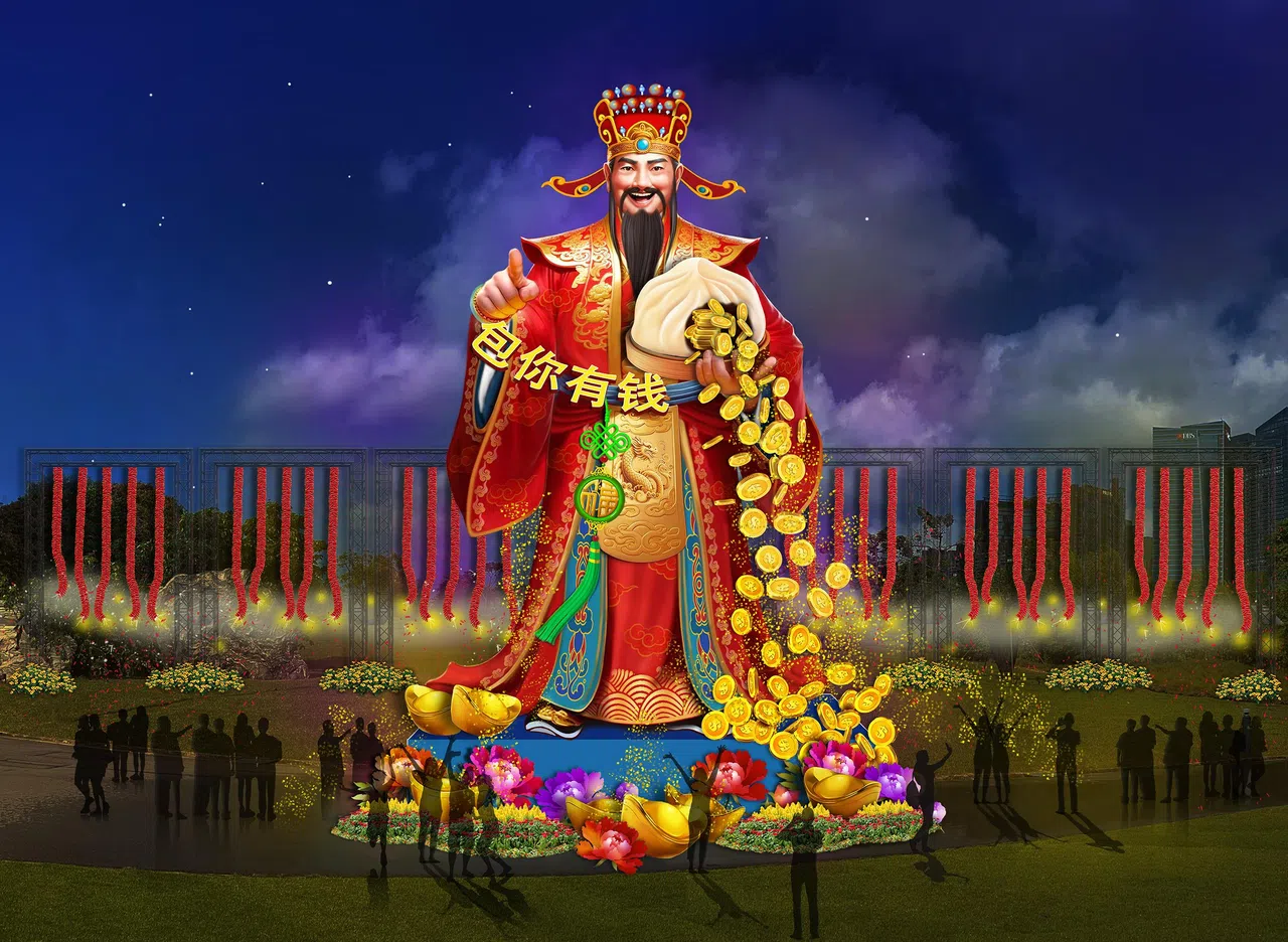 财神爷大型灯饰上面有“包你有钱”四个字，“包”寓意“保证”，又指传统美食“包子”，因此财神爷手上捧着装满金币的大包子，脚下摆放金银元宝，祝福前来打卡拍照的民众财运亨通。（春到河畔2025工委会提供）