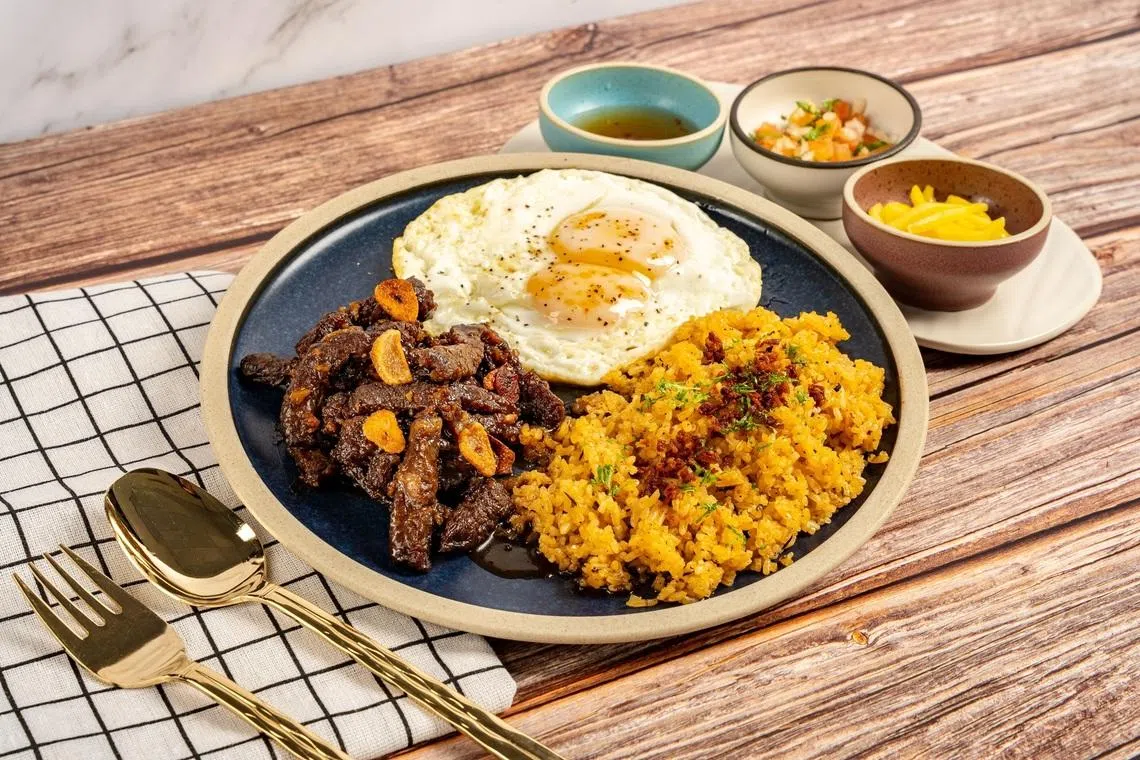 牛肉饭tapa是菲律宾人三餐都能吃的熟悉美味。（餐馆提供）