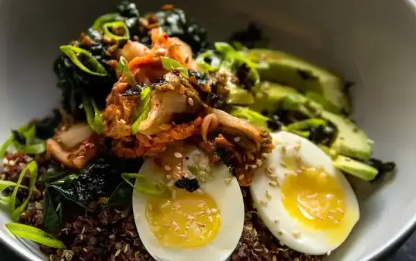 Quinoa and Rice Bowl With Kale, Kimchi, and Egg