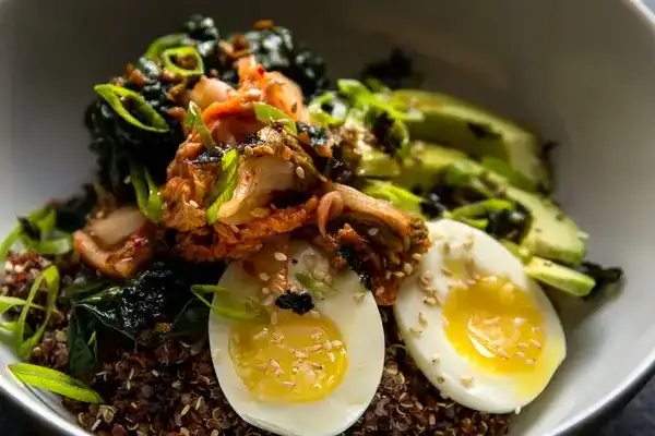 Quinoa and Rice Bowl With Kale, Kimchi, and Egg